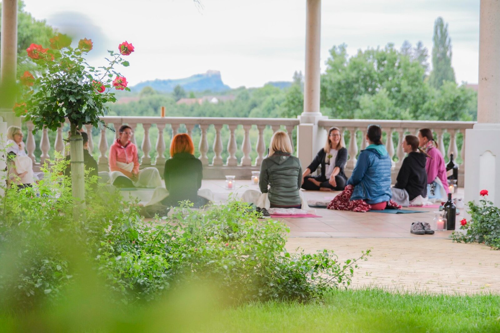 group of people in circle talking to each other at Wine Zen event