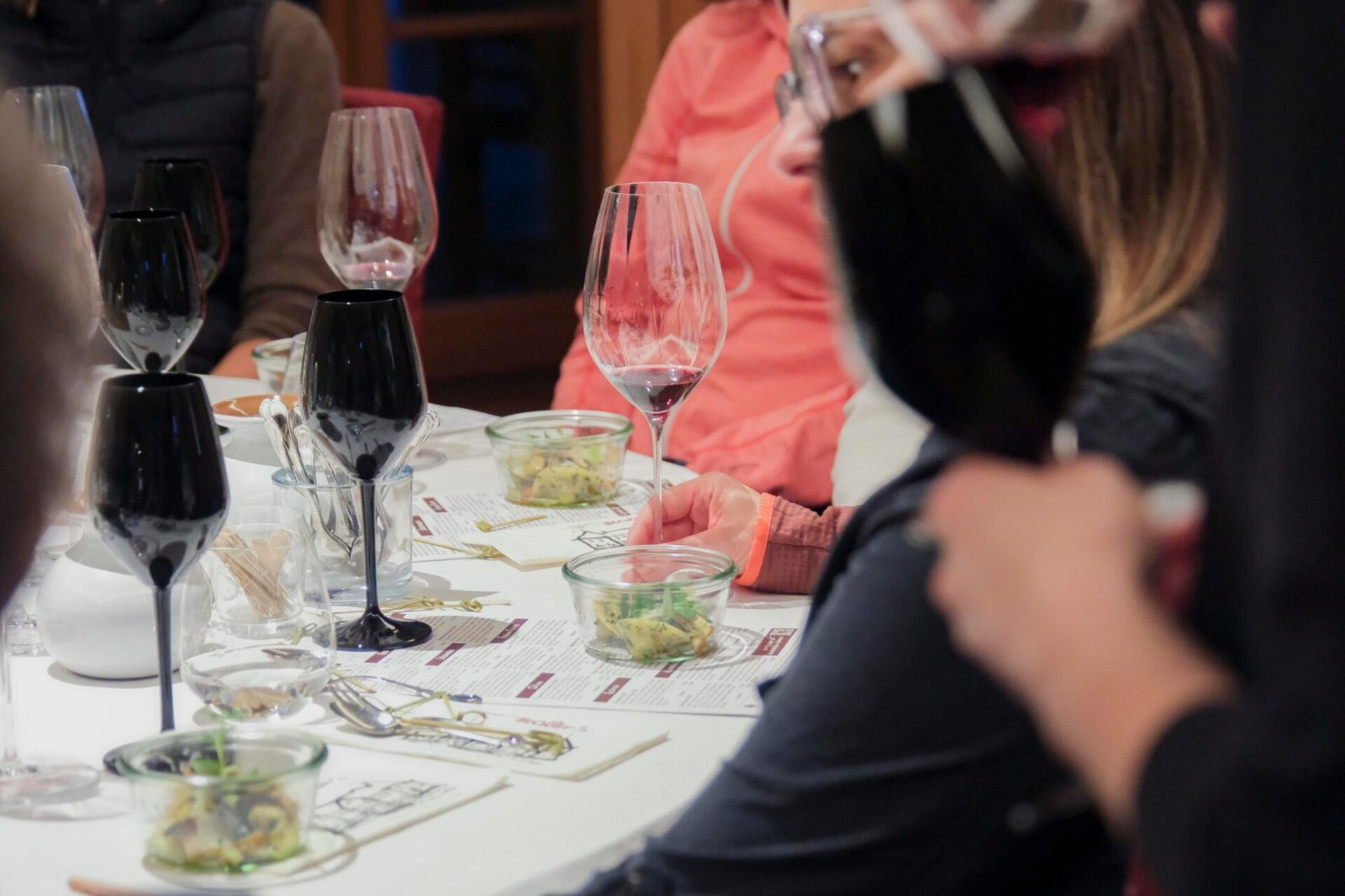 wine tasting with black glasses at Weinschloss Thaller